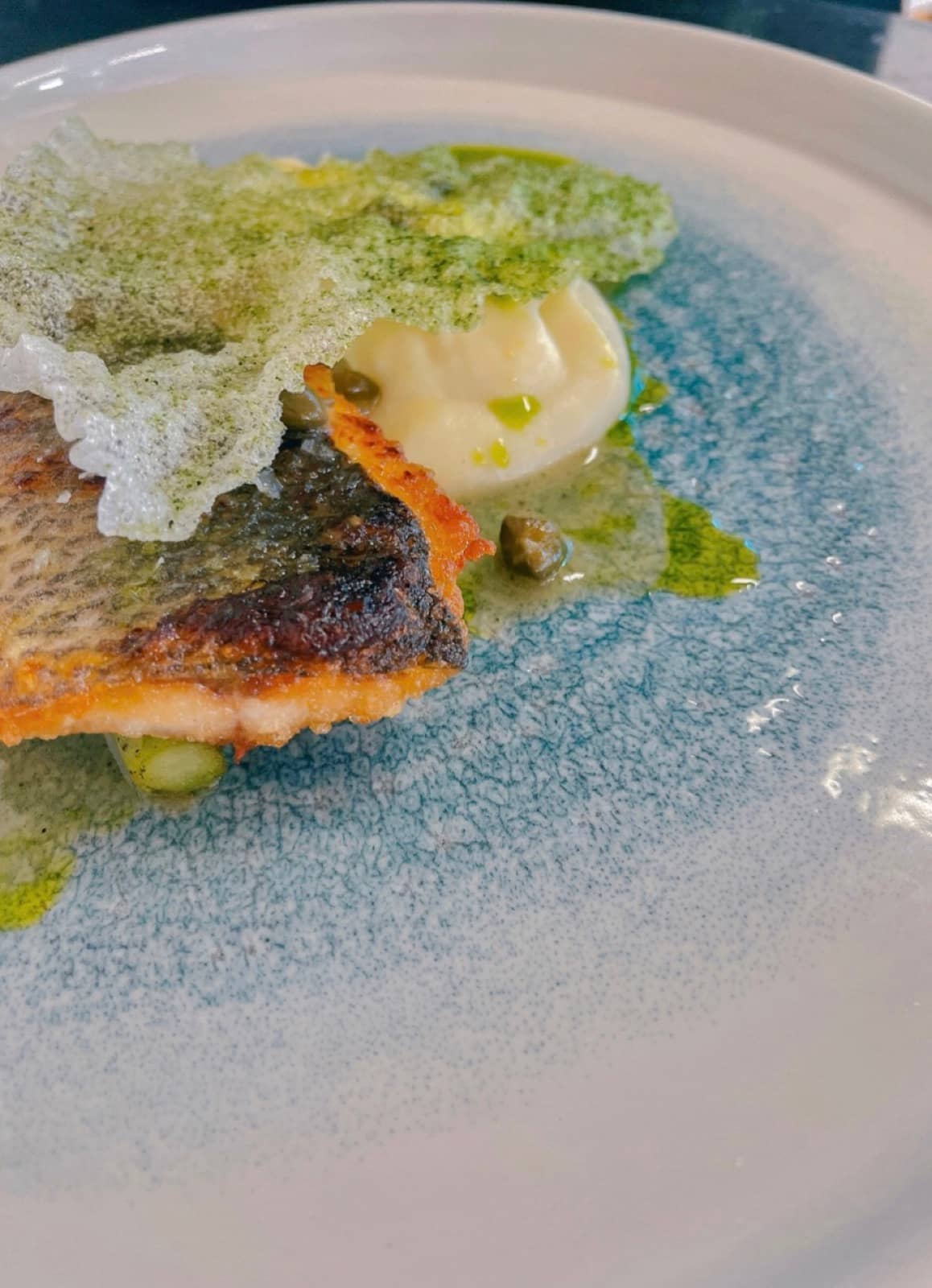 Crisp skin, herb oil, a green crisp.