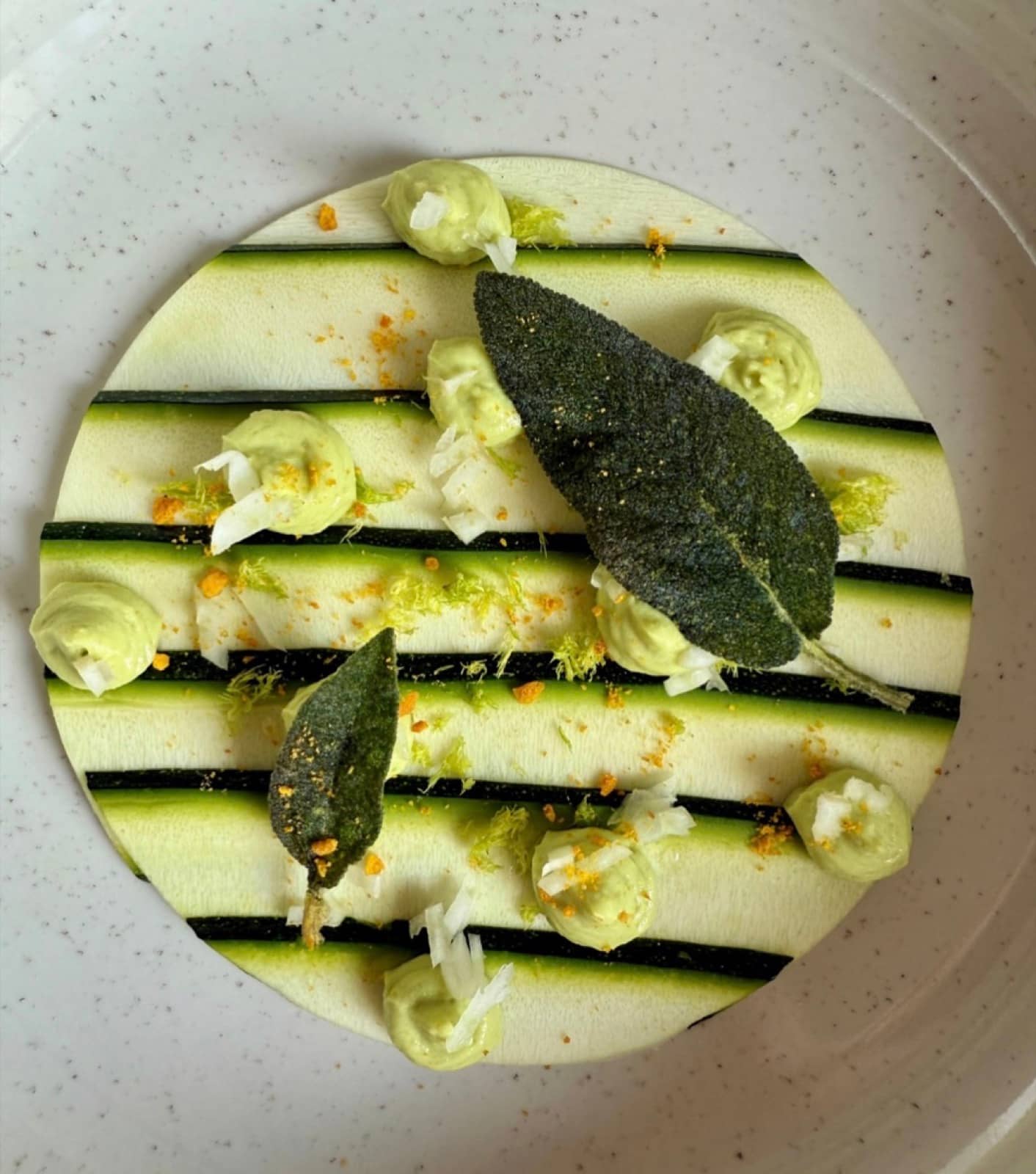 Shaved courgette, sage, lemon and a herb cream.