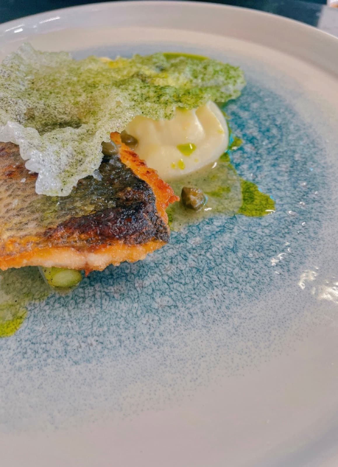 Crisp skin, herb oil, a green crisp.